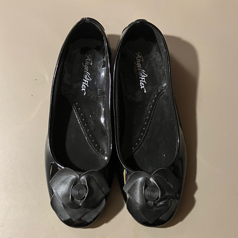 Stylish Black Flats with Floral Detail